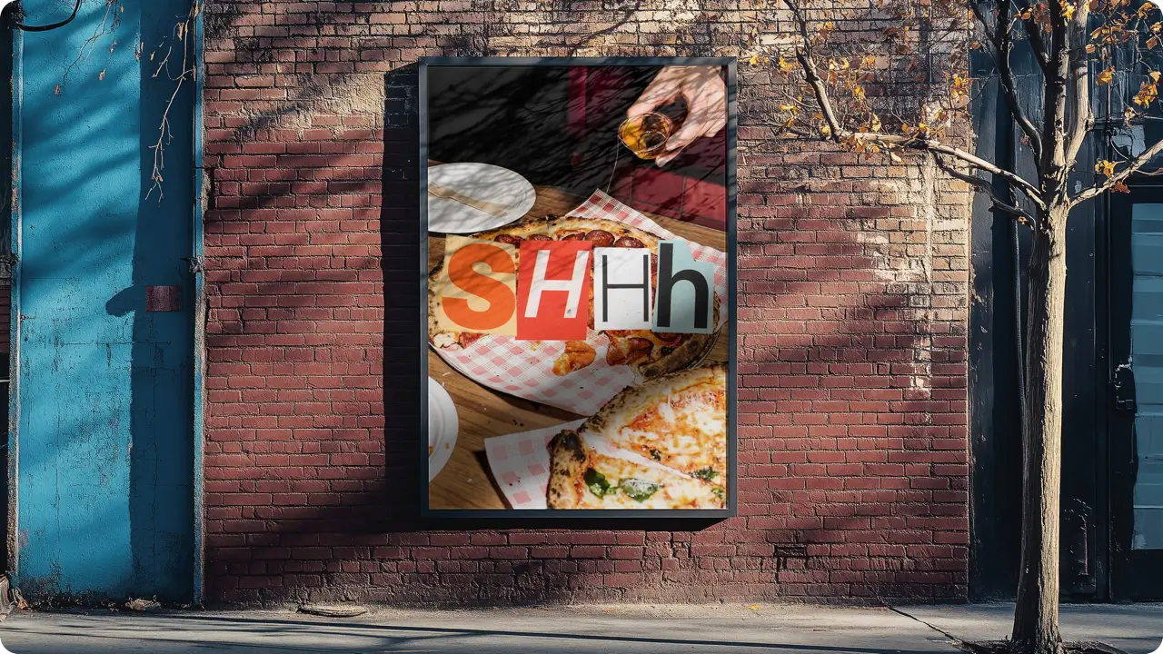 Image of a billboard on an empty street. Urban environment.